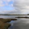 Installing 1 km of marine grade, SWA, fibre optic cable across a tidal waterway